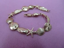 14K Solid Y. Gold Seashell Starfish Sand Dollar Beachy Bracelet 7.25" 14.2 grams