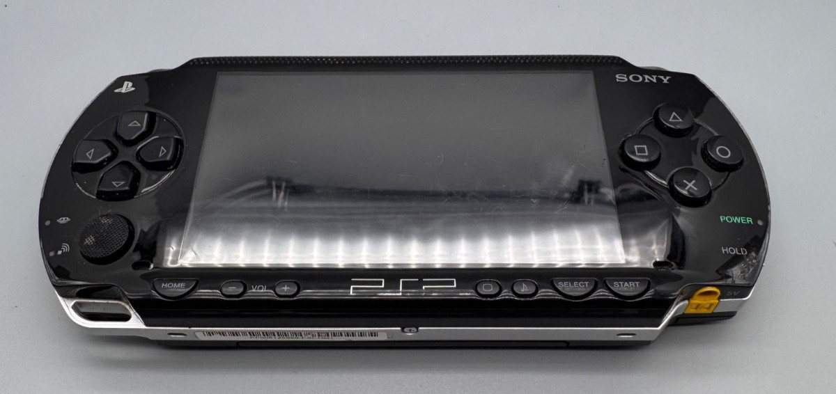 Sony PSP 1001 Console, Charger and Memory. Tested and Working. *Needs Battery*