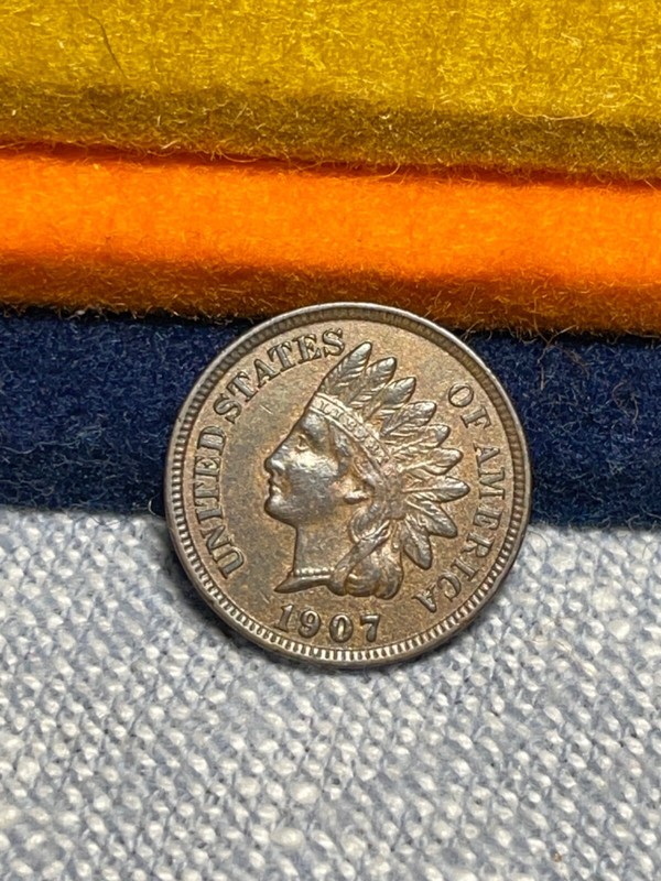 (#100439)  Indian Head Cent:  1907.    UNC/BU.  great luster.   (see video!!)