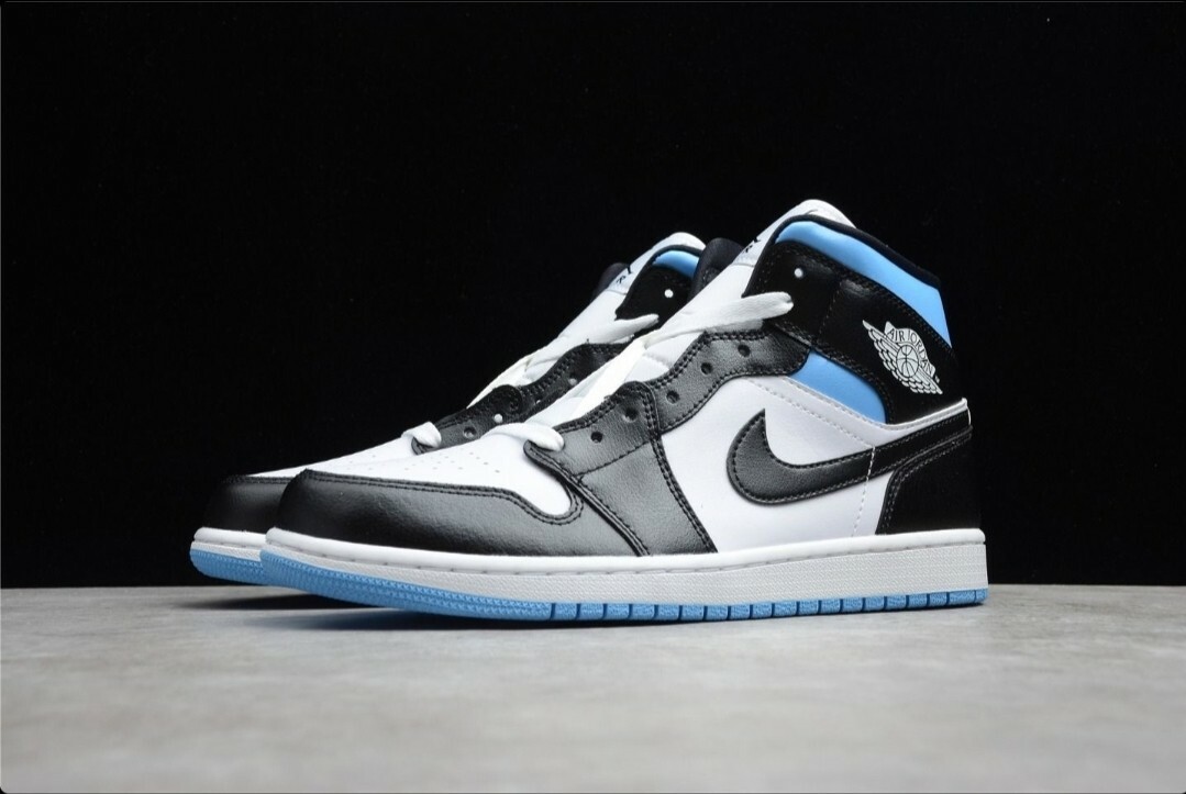 Nike Air Jordan 1 Mid UNC Blue Women's Size 9.5, Men Size 8 Nike Air Jordan 1 Mid UNC Blue Women's Size 9.5, Men Size 8