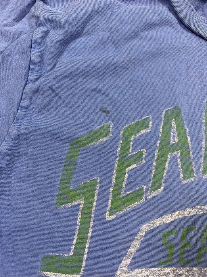 Camiseta azul de fútbol americano Seattle Seahawks para niños talla 8 comida chatarra marca NFL gráfico Foto 2 de 4