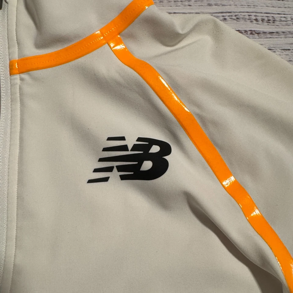 Jaqueta de corrida New Balance leve reflexiva creme e laranja XS - Imagem 3 de 4