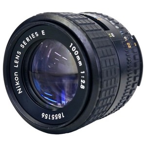 2 Objectifs Nikon Series E, 100mm 2,8 et 28mm 2,8, avec défauts