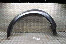 BFD089682 2013 MITSUBISHI L200 2.5 DID FRONT WHEEL ARCH TRIM MUDFLAP N/S
