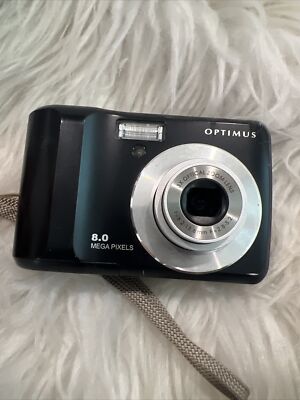 Optimus 8.0 Mega Pixels 3x Optical Zoom Lens Compact Camera