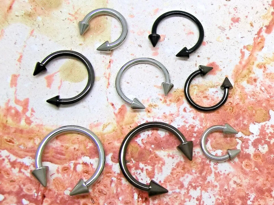 Perforación de Herradura Septum Hélice Nariz Oreja Cono Spikes Acero Plata Negro