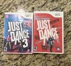 LOT OF 2 NINTENDO WII JUST DANCE VIDEO GAMES JD AND JD 3. Used but works.
