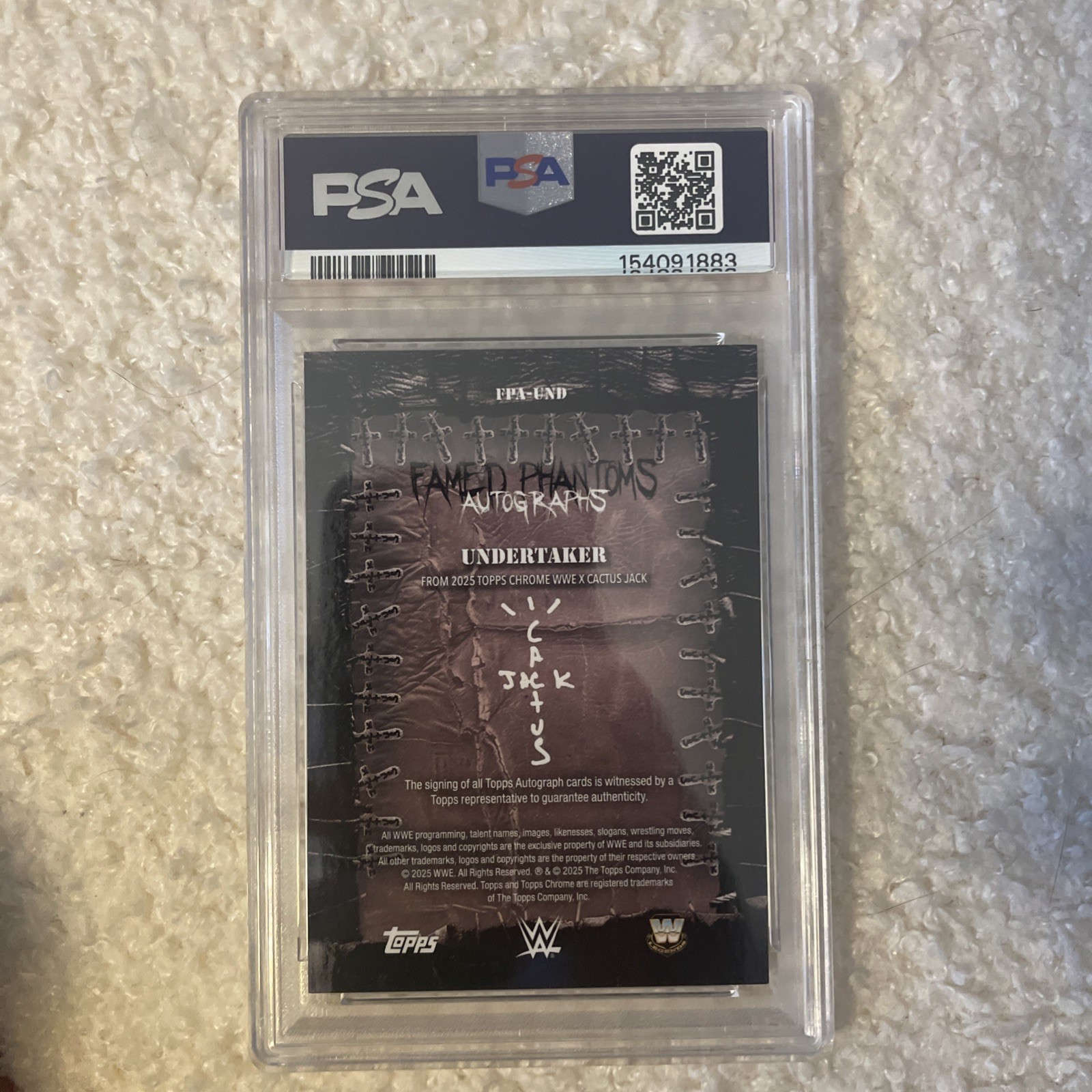 2025 Topps X Cactus Jack- Undertaker, Famed Phantoms Autograph Orange /25. PSA 8 view 2