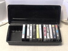 tape cassette lot with storage case lot if 12 ac/dc,david Bowie,garthbrooks 3543
