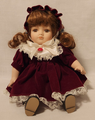Delton Porcelain Doll - Sitting 7'' Maroon Dress & Bonnet Light Brown Hair & Eyes