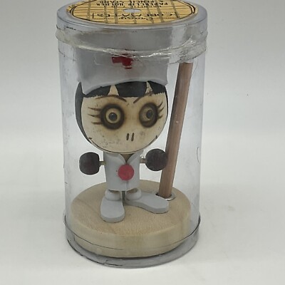 Zombie Nurse, crazy cubemates, holds pencil and paperclips on its magnetic head