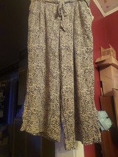 AMERICAN EAGLE WOMENS CHEETAHS PANTS XL Draws...