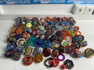 HUGE BEYBLADE BURST LOT TAKARA TOMY ORIGINAL 100% 80 BeyBlade over 100 PARTS