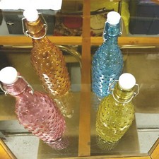 Set of 4 Multi Colored Decorative Glass Bottles With Top Stoppers