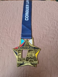 ASICS - Introducing the 2026 Conquer LA Challenge Medal