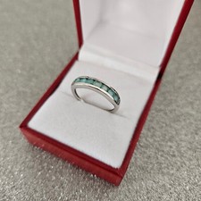 Grandidierite Half Eternity Ring in platinum over Sterling Silver