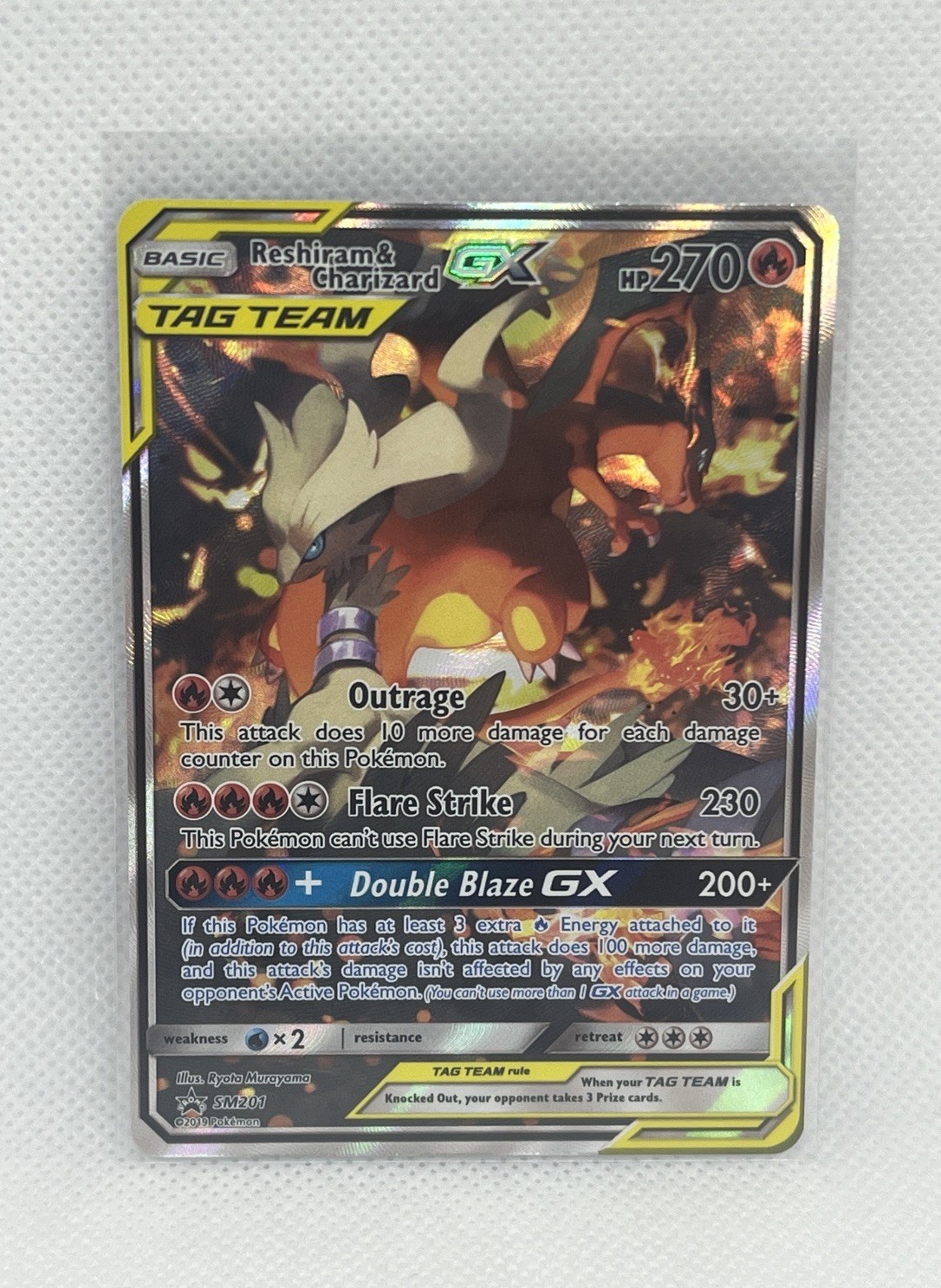 Pokemon Reshiram & Charizard GX Tag Team SM201 Black Star Promo