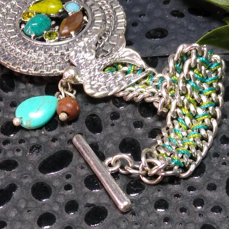Pulsera de diseñador BOHM con detalles de plata, turquesa, madera y piedra redonda ¡con pájaro! Foto 2 de 4