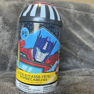 Transformers Optimus Prime/ Megatron  48-Pc Puzzle in Capsule Tin