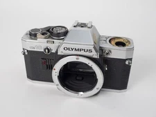 Olympus OM System OM-10 35mm SLR Film Camera Silver for Parts or Repair