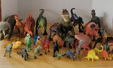 Mixed Lot of Dinosaur Toys 36 Total. Some Stationary And Some Arms And Legs Move