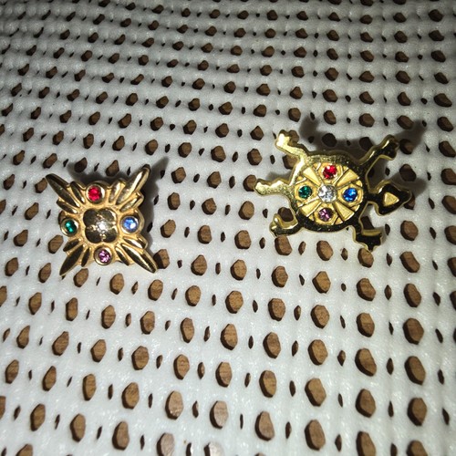 Mohegan Sun Casino – 14KT Gold  Filled 5 year pin.  10 Year pin not gold.