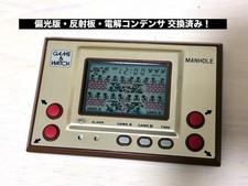 Thumbnail of ebay&reg; auction 800148858270 | Nintendo Game & Watch Manhole MH06 Gold Series Gepflegte Handheld-Konsole