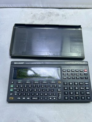 SHARP PC-E500 Pocket Computer Vintage Japan FOR PARTS OR REPAIR