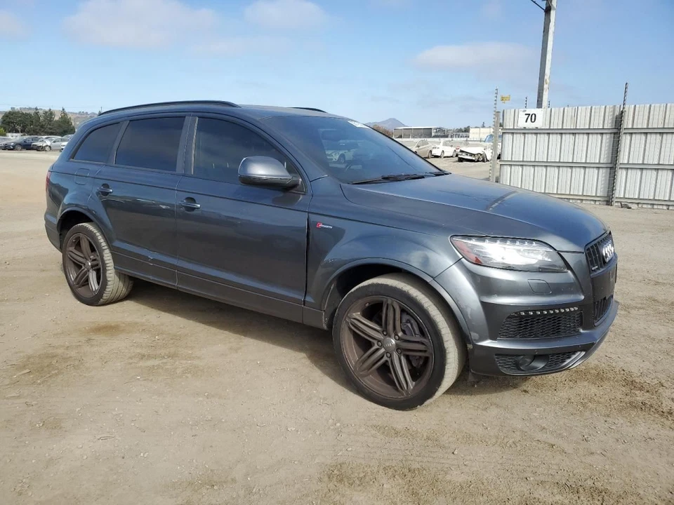 BOTE DE CARBÓN DE VAPOR DE COMBUSTIBLE 7L8 201 801 B 2013 AUDI Q7 AUDI Foto 4 de 4