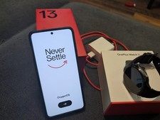 Unlocked One Plus 13 16gb/512gb with One Plus Smart Watch