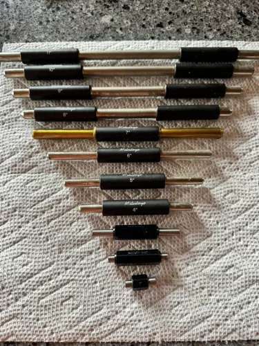 Mitutoyo 1 to 11 inch long, 11 piece micrometer calibration standard set.