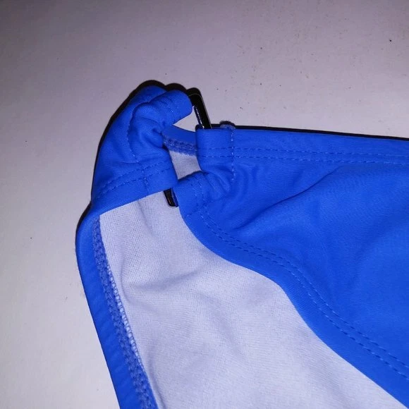 Parte inferior de bikini de natación Jaclyn Smith azul liso plateado herrajes trajes de baño Foto 2 de 4