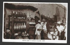 ADEN 1948 REAL PHOTO CARD OF NATIVE SHOP IN MAALLA VILIAGE ADEN TO ENGLAND