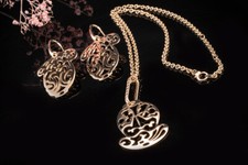 Pomellato Set Collier Anhänger Ohrringe Ming mit Diamanten 750er Rotgold Schmuck