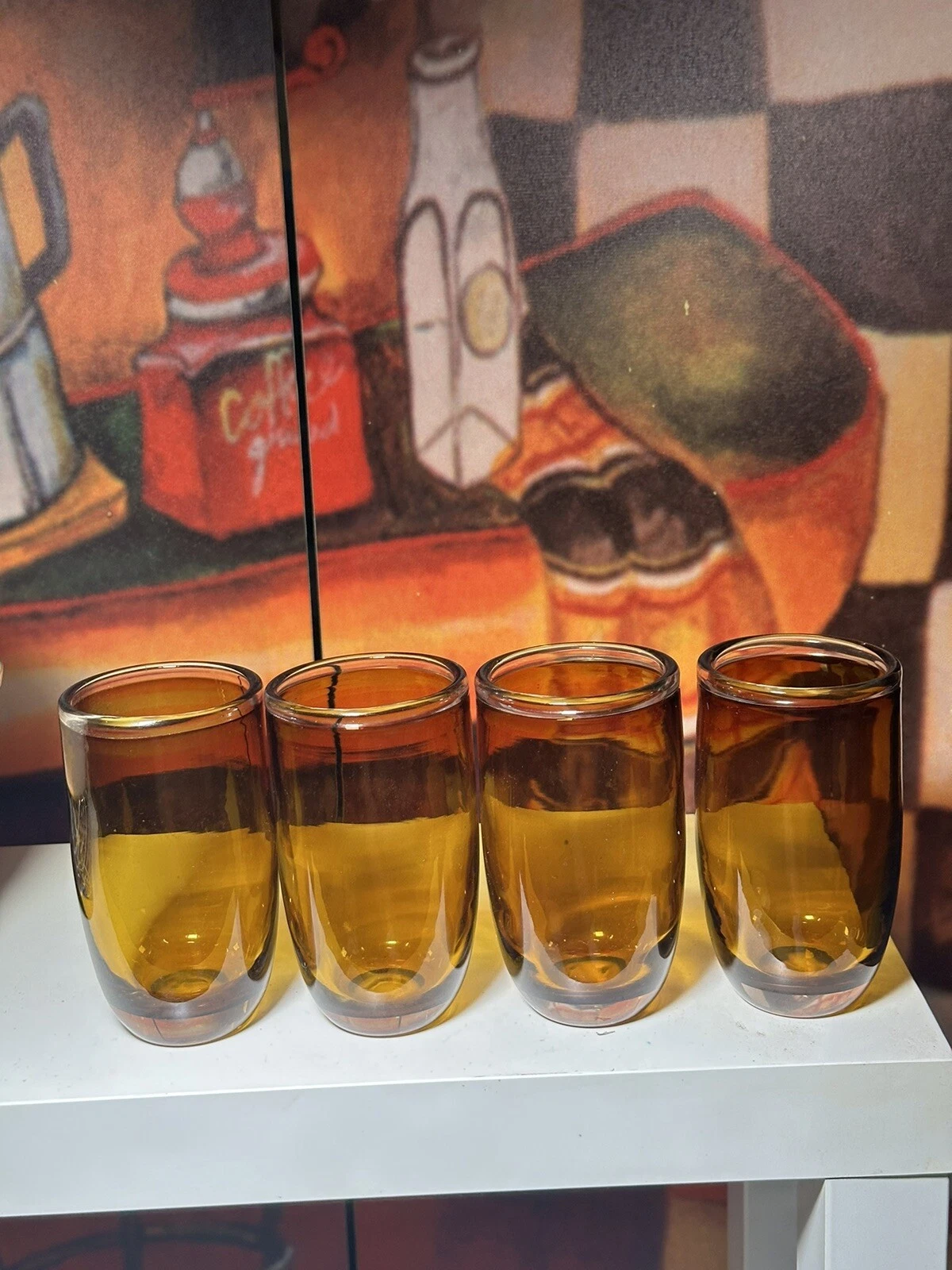 Set of 4 vintage amber colored juice glasses  4 inches tall  6 8 oz
