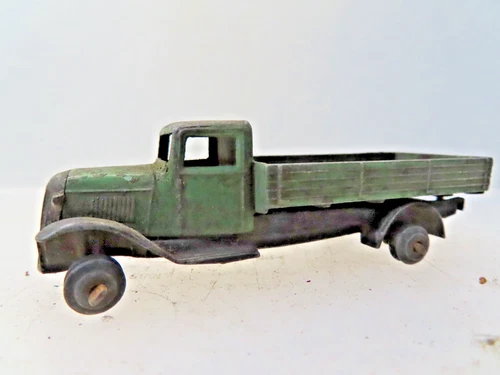 Vintage DINKY  Early flat bed truck in fair condition ..*