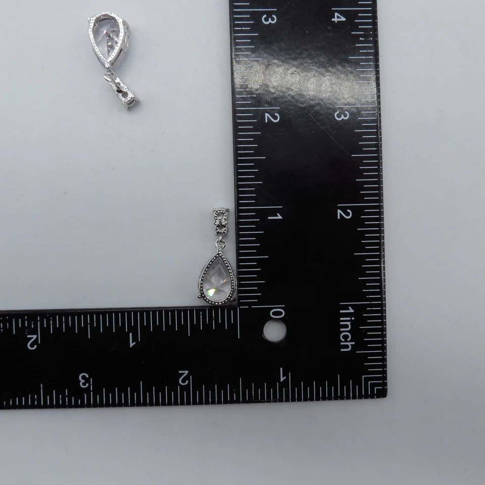 Pendientes colgantes lágrima circonita cúbica tono lavanda hermoso color suave Foto 4 de 4