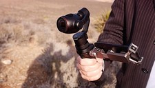 DJI Osmo Handheld Gimbal 4K camera with 3x zoom and phone holder as viewer