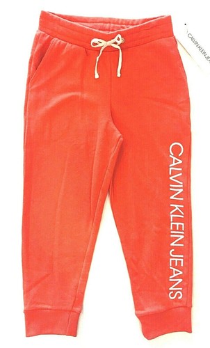 Calvin Klein Jeans GIRLS Taglia S/P (7) Corallo Scuro Elastico in Vita  Pantaloni Della Tuta | eBay