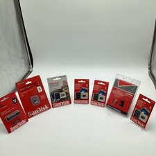 Lot Of Six Sandisk Memory Cards And SD Cards Includes A Flash Drive. All Sealed