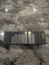 ALLEN BRADLEY SLC-500 10-SLOT RACK 1746-A10. W/ SLC 500 CPU 5/04. W/ MODULES.