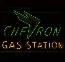 One of several neon signs that are part of the decor inside Kelly's Olympian