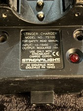 Streamlight Stinger Charger 75100 With wall plug car charger.