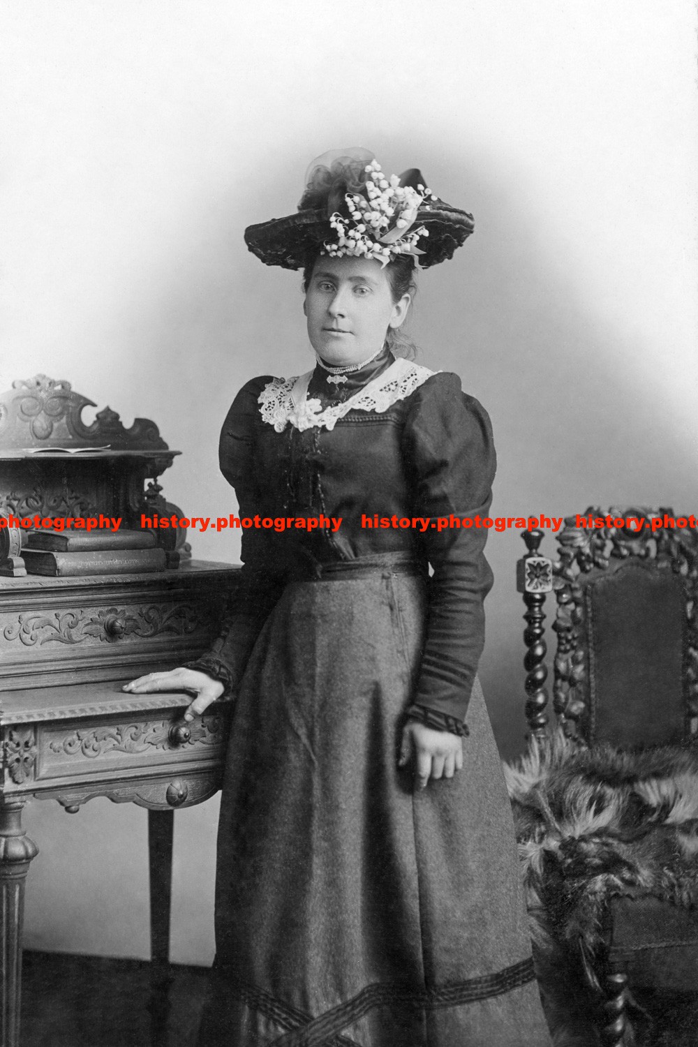 F015936 Woman Wears Dark Blouse and Skirt On Head Hat London 1890