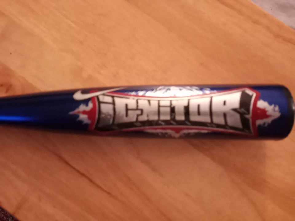 Bate de béisbol juvenil Nike Ignitor 28” 17 oz. Barril de 2 1/4" negro/azul -11 Foto 2 de 4