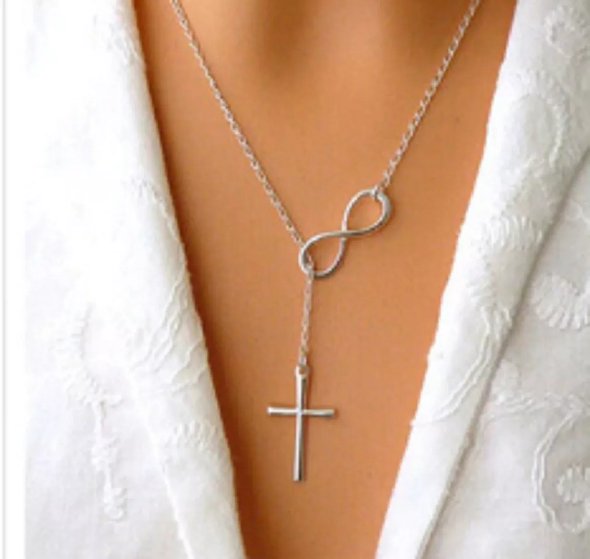 Cross infinity necklace deals