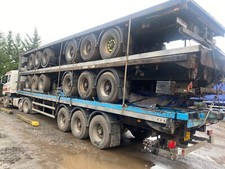 Stack of 5 flat trailers