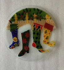 Peggy Karr Fused Glass Christmas Plate with Stockings Hanging from a Mantel. MIB
