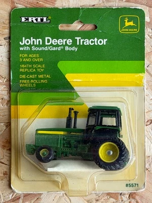 ERTL 1:64 5571 JOHN DEERE TRAKTOR TRACTOR NEU IN OVP (M-7) - Bild 1 von 2