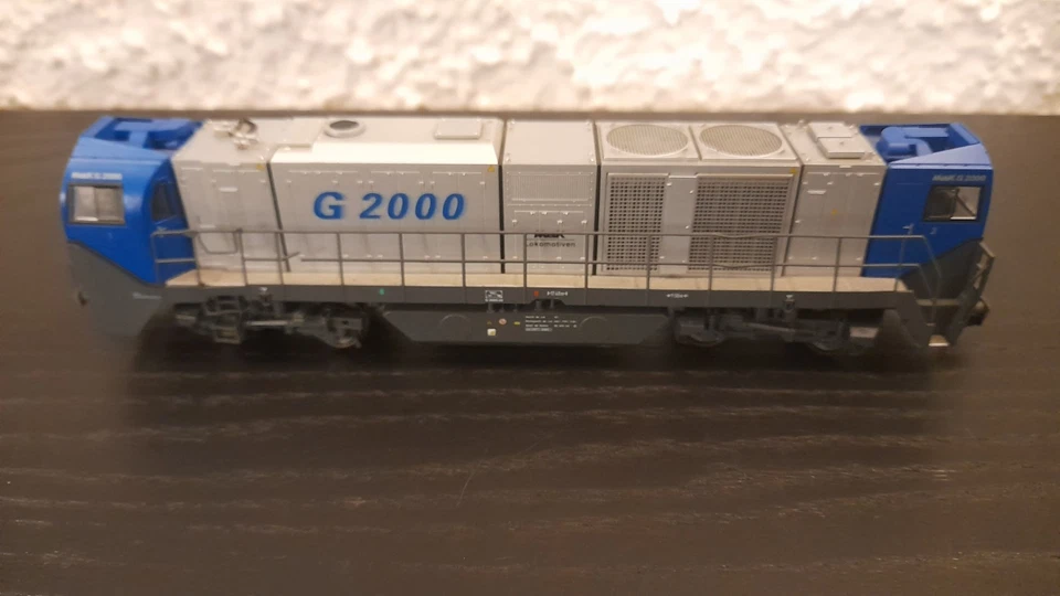 Treno Mehano Locomotiva Diesel G2000 Blue Vossloh Scala H0 Con Decoder - Imagen 2 de 4
